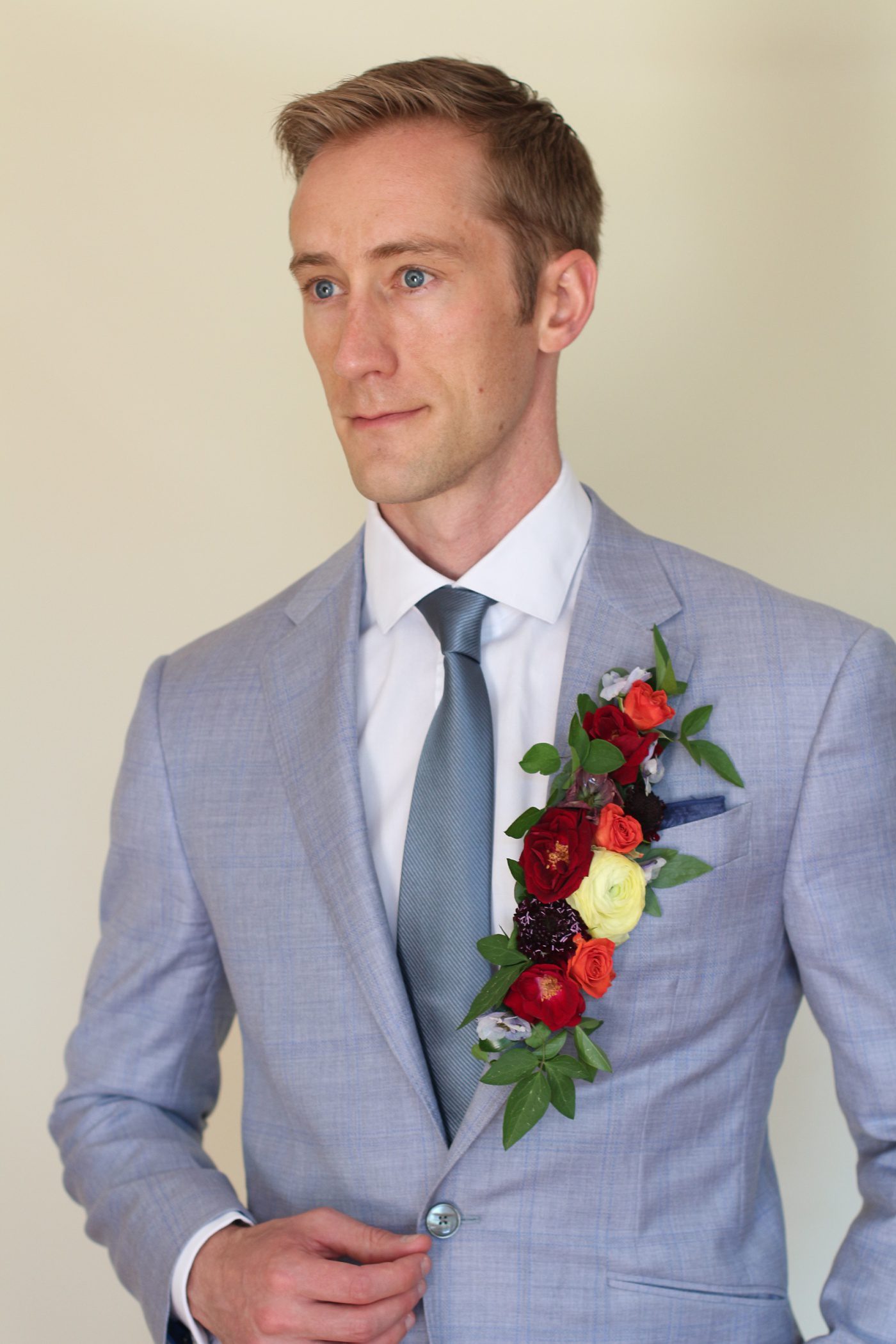 a jacket lapel covered in flowers
