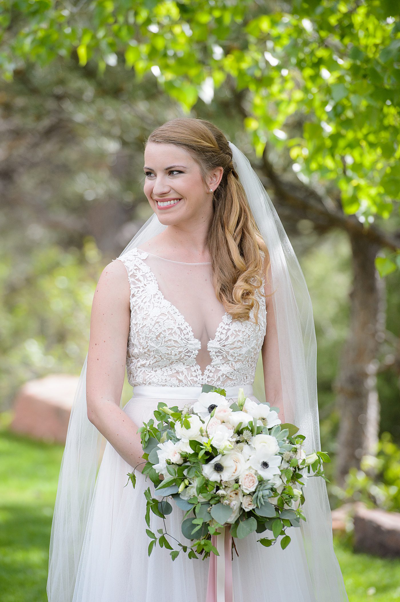 bride with blush and green garden bouquet