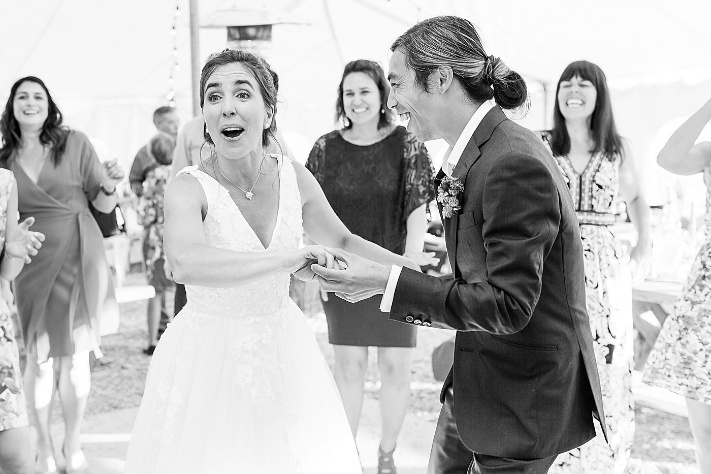 bride and groom dancing at a wedding reception