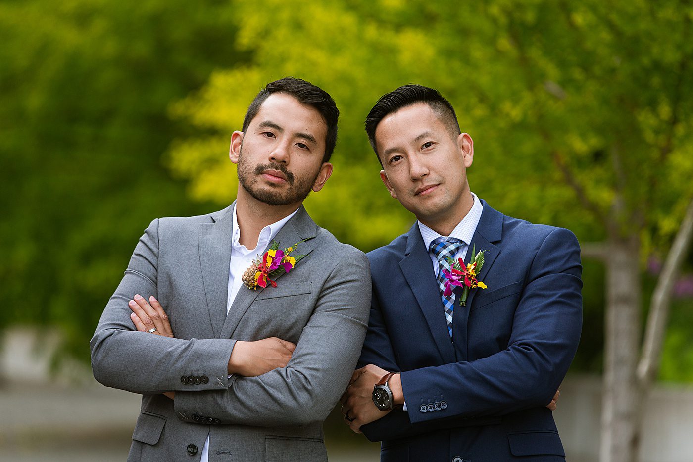 groomsmen wearing colorful boutonnieres