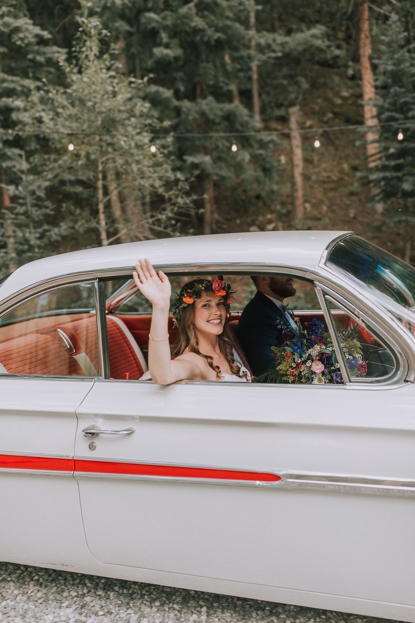 bride and groom in a car