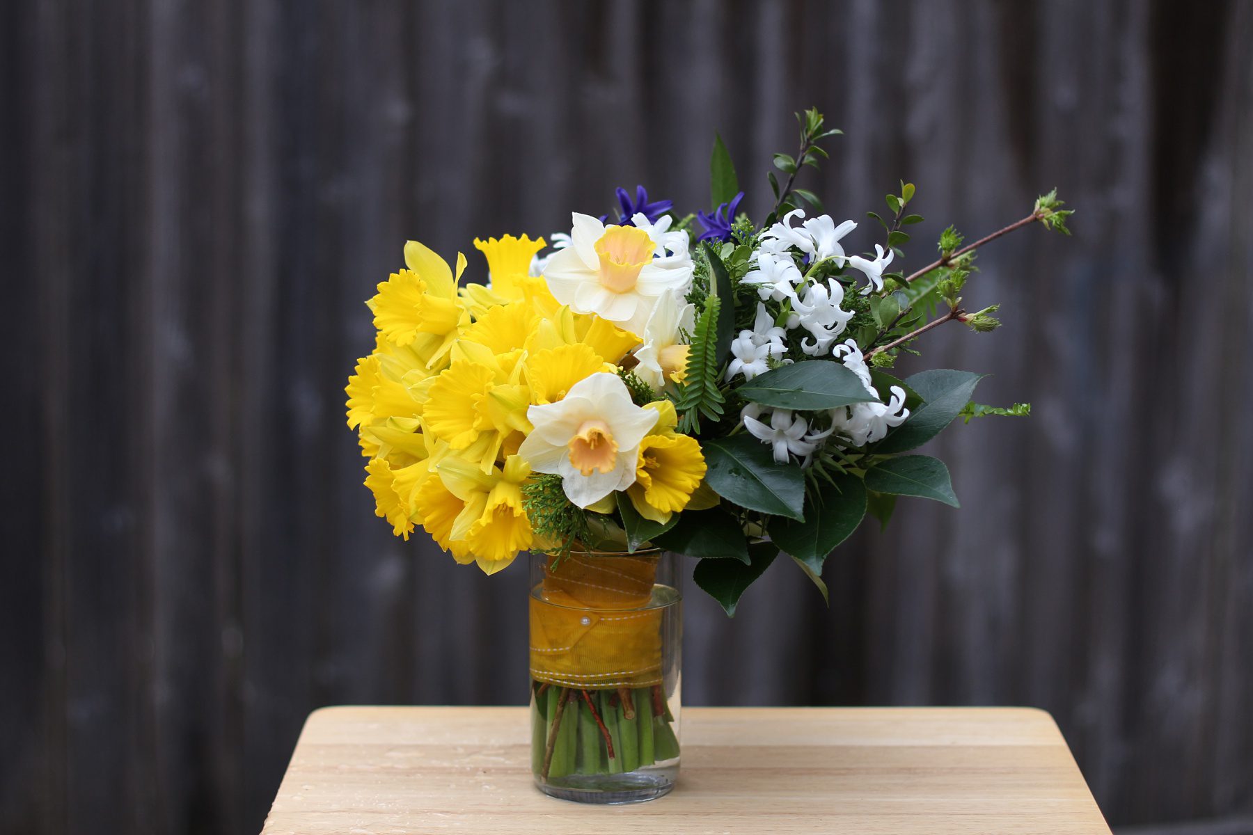 green, yellow, and white daffodil bouquet