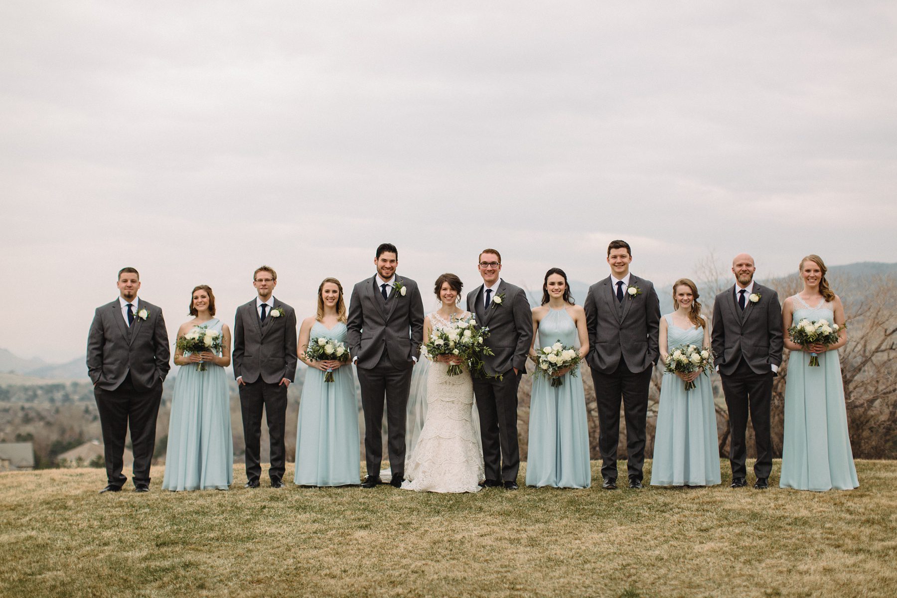 bridal party with light blue dresses