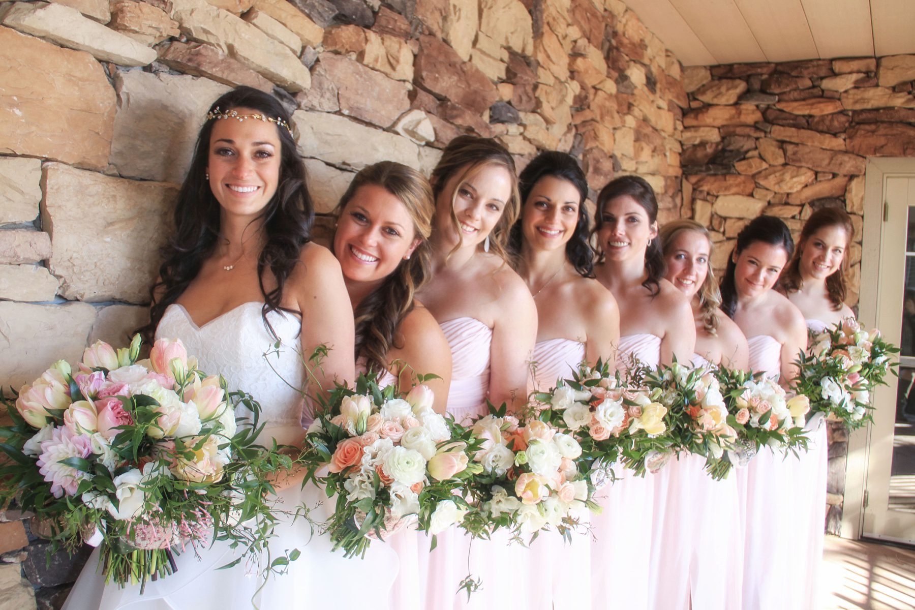 bridal party with lush blush wedding bouquets