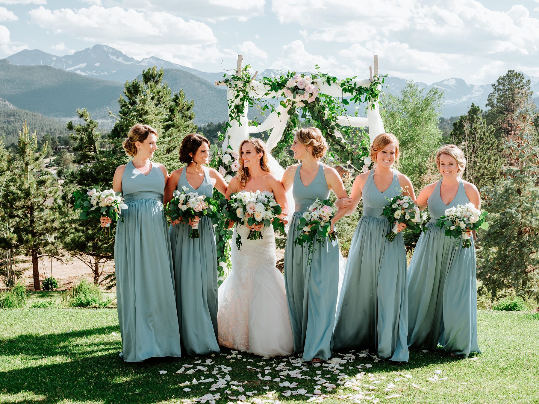 bridesmaids wearing blue dresses