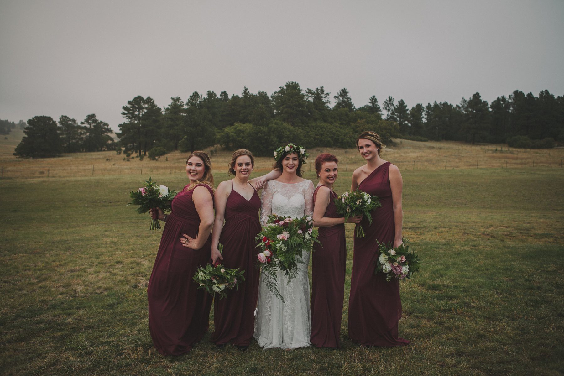 bridesmaids wearing burgundy dresses