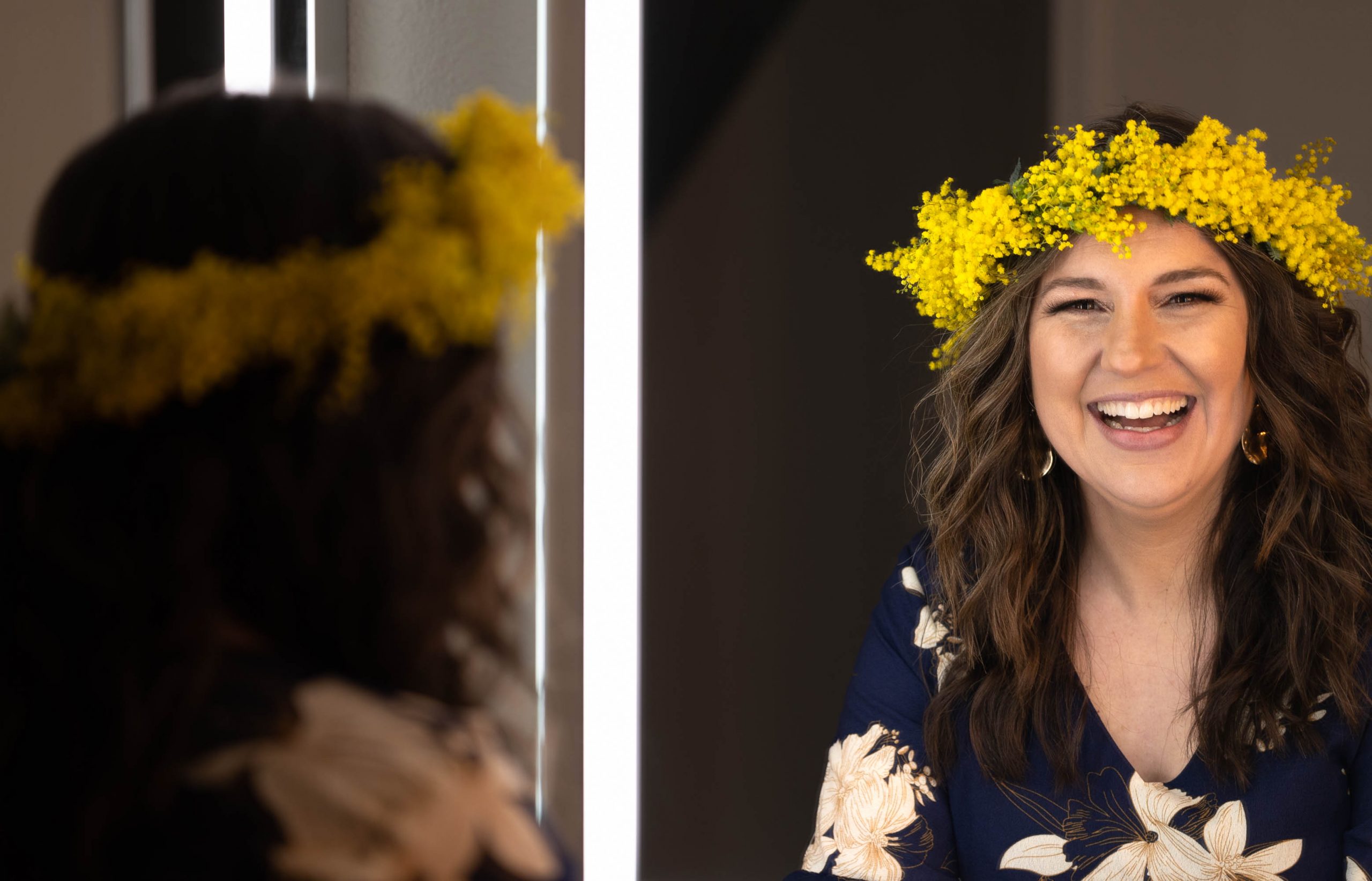 Rebecca Grant wearing a yellow flower crown