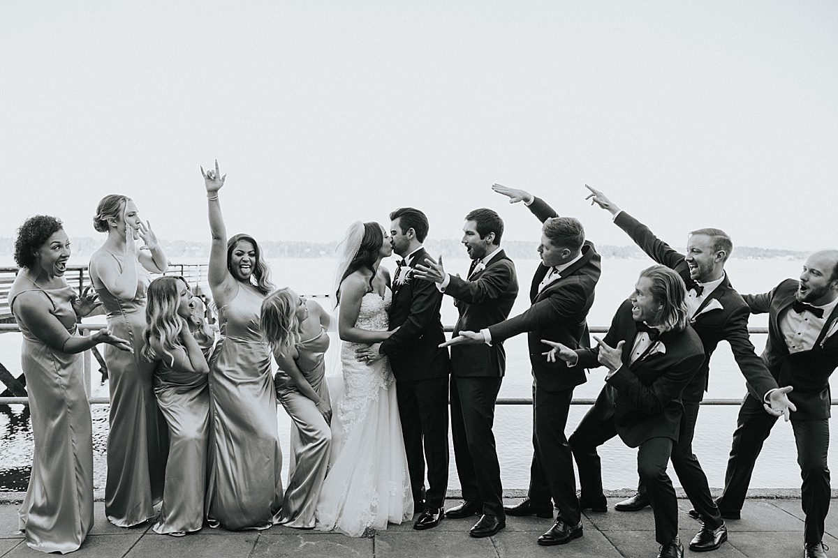 a wedding party cheers