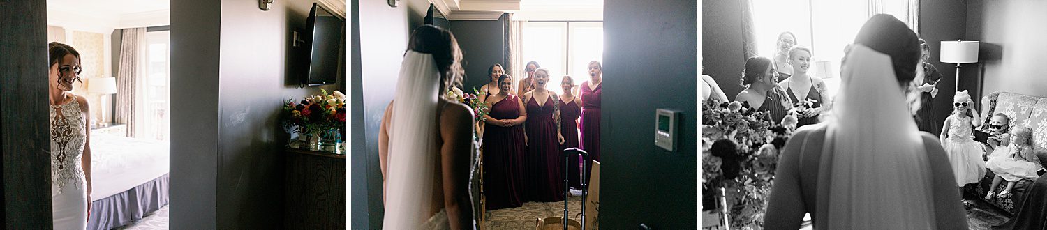 bride showing herself in her wedding dress to her bridesmaids and flower girls