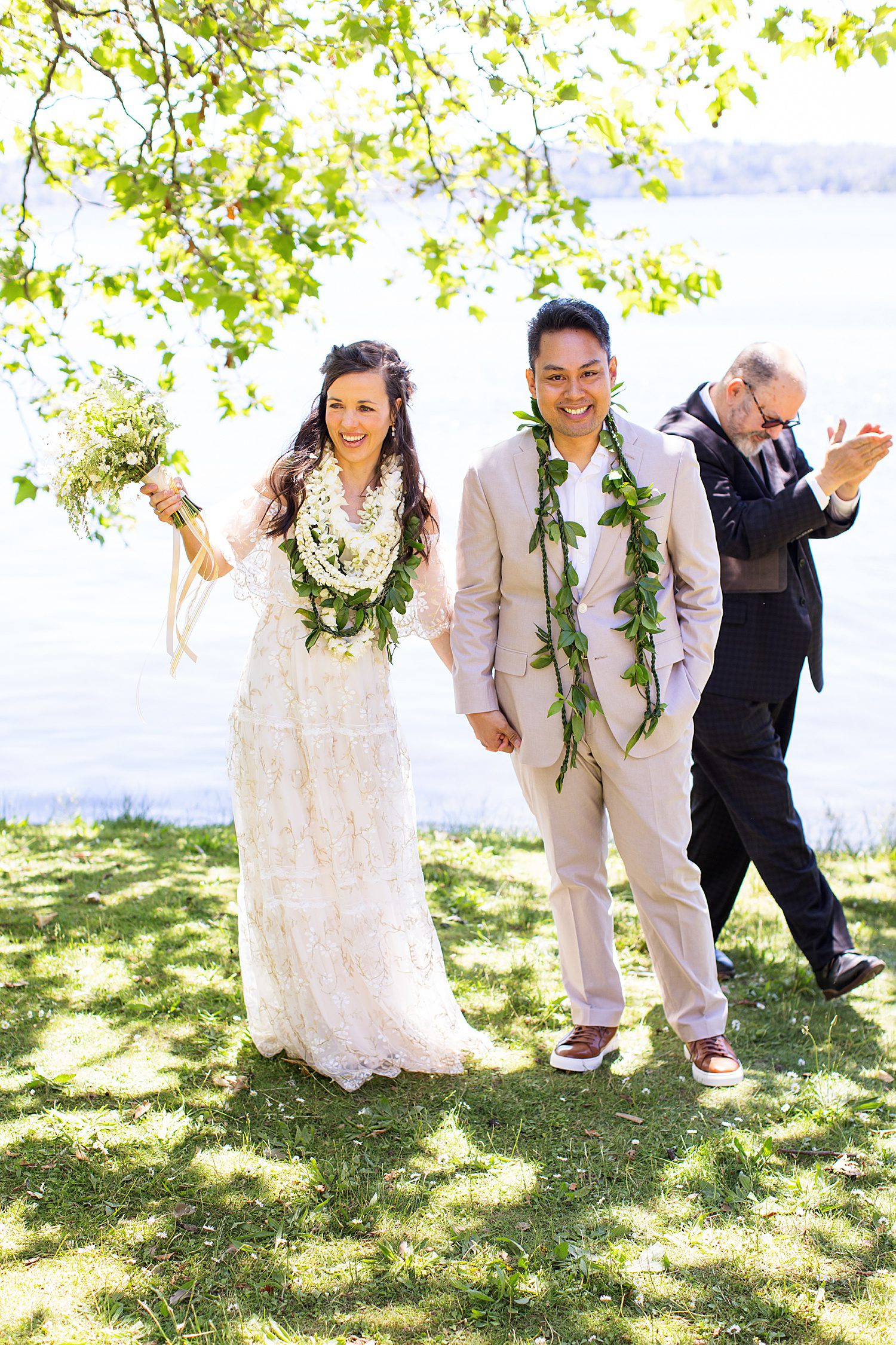 bride and groom wearing Hawaiian leis