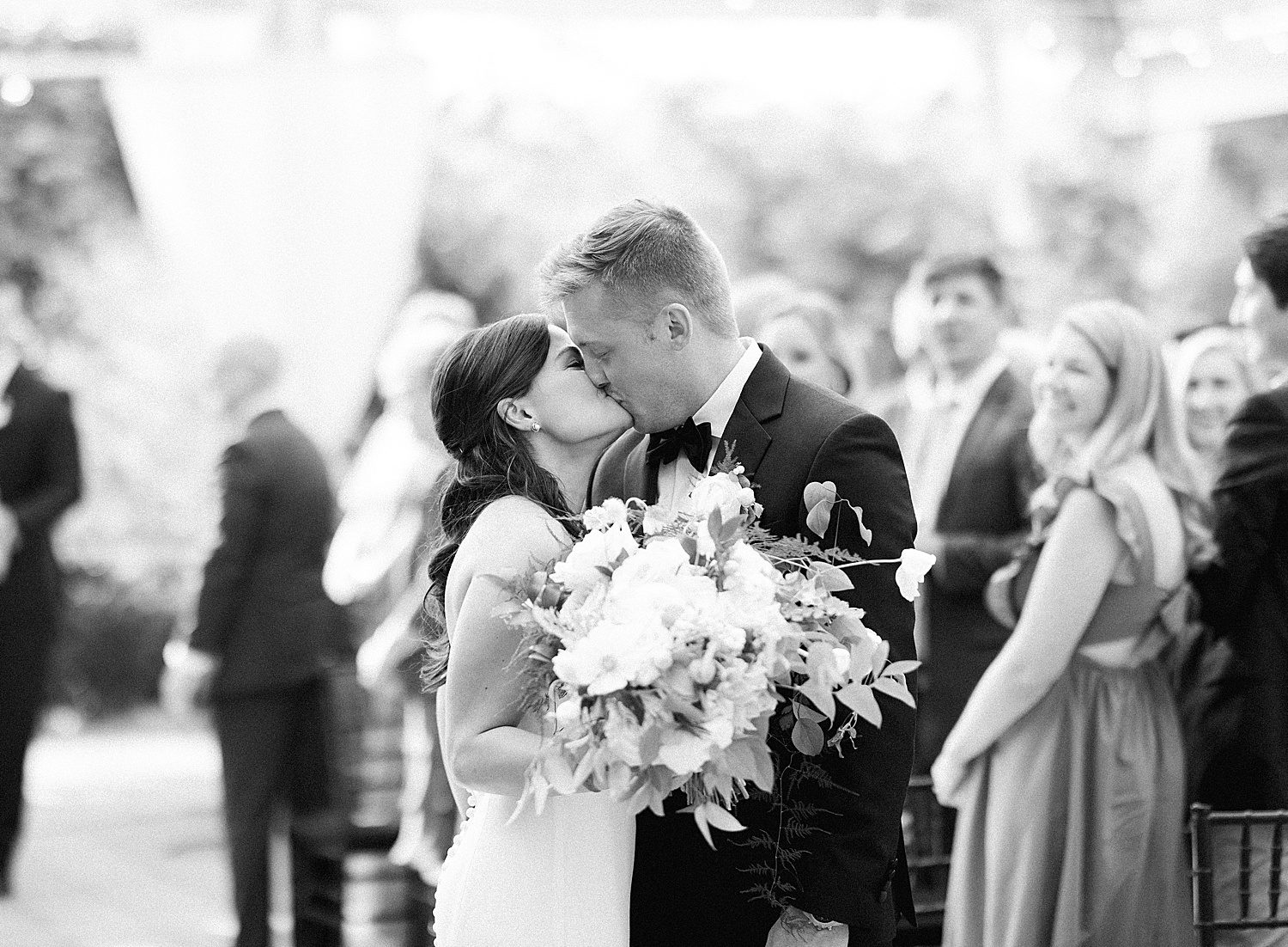 bride and groom kissing