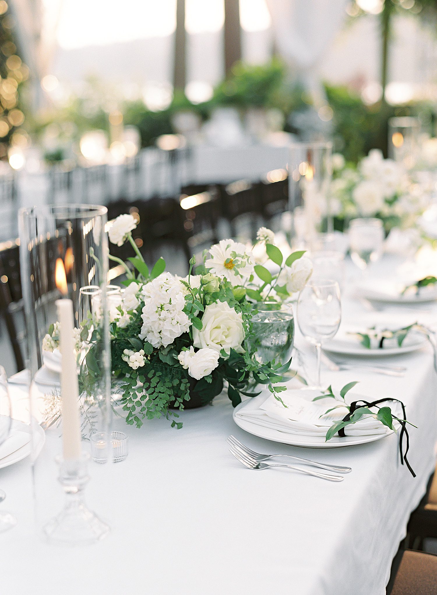 rectangular table with green and white flowers