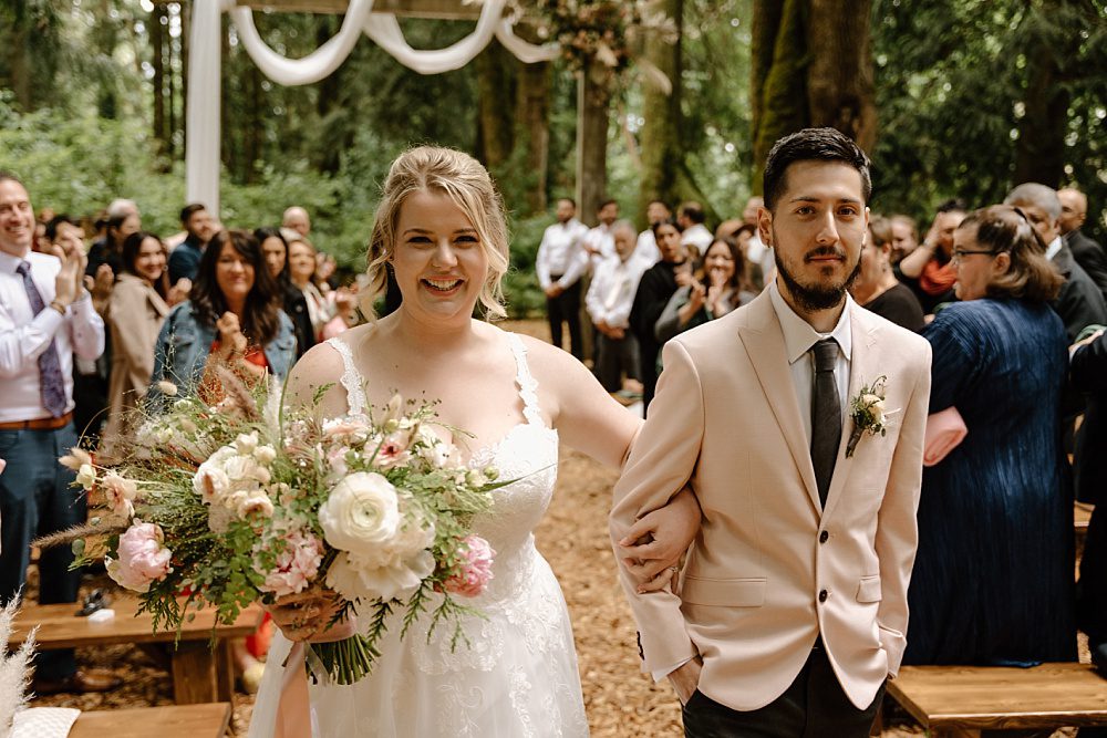 bride and groom walking down the aisle at Twin Willow Gardens