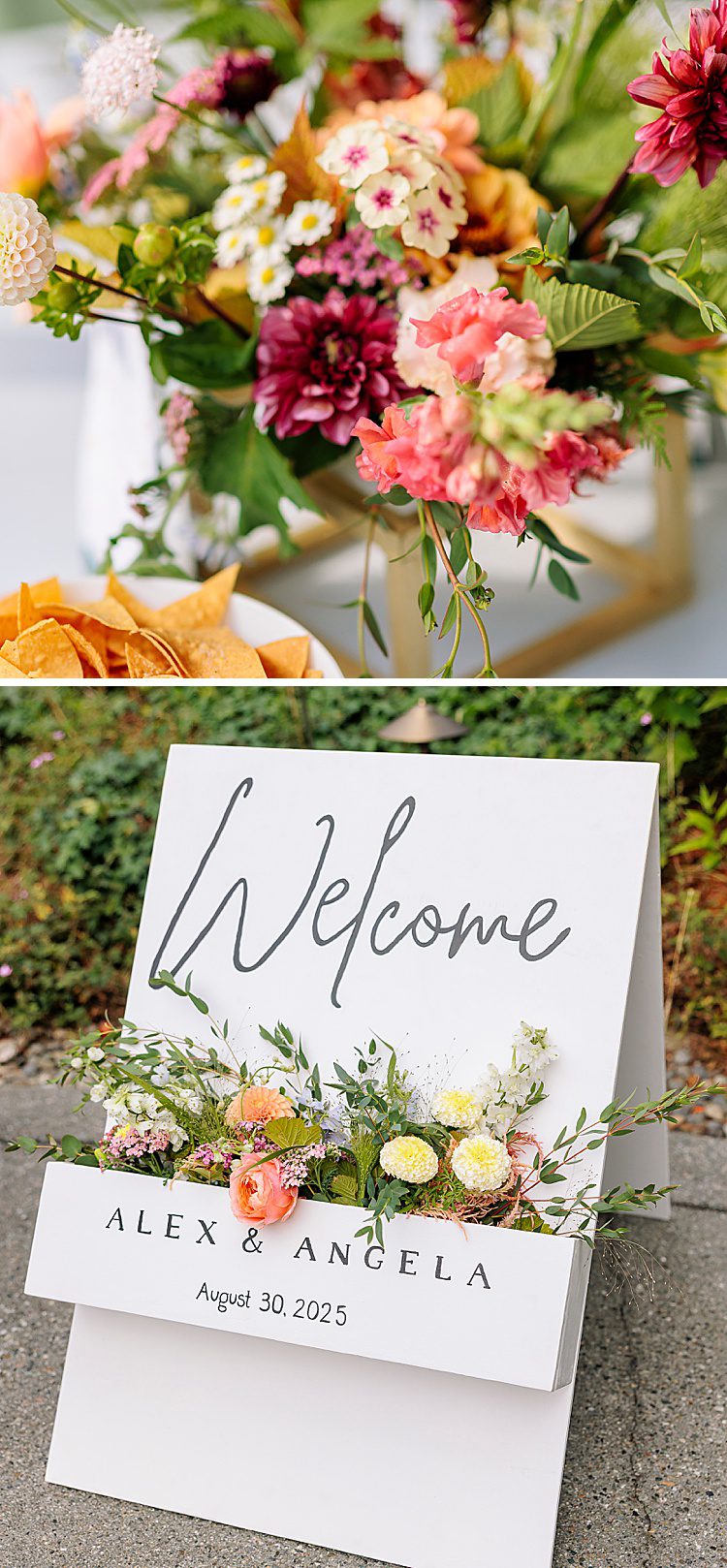 a colorful floral centerpiece and box flowers in a wedding sign