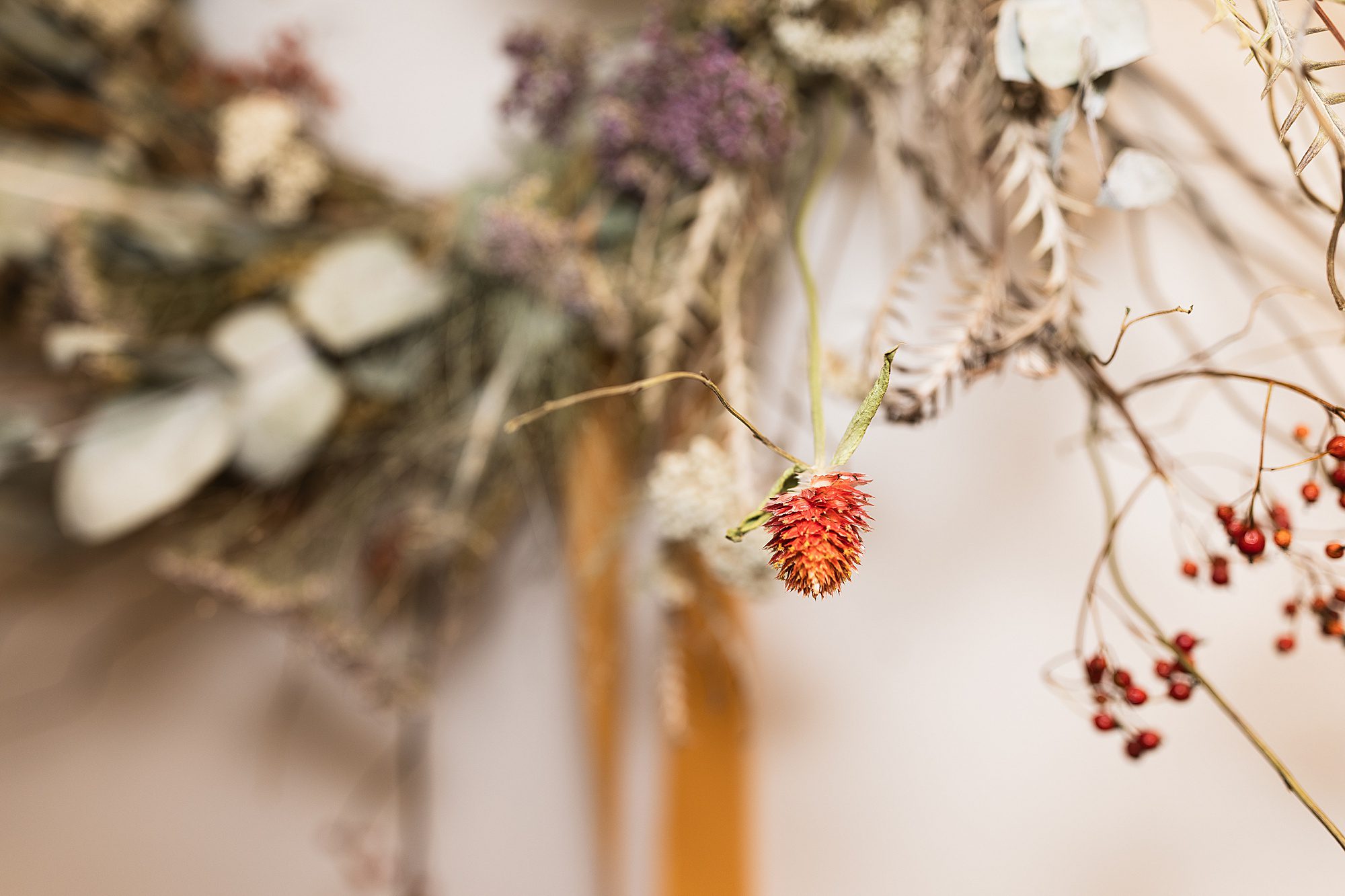 dried orange flowers and berries wreath